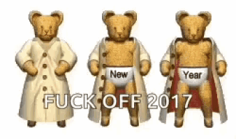 three teddy bears are standing next to each other wearing diapers .