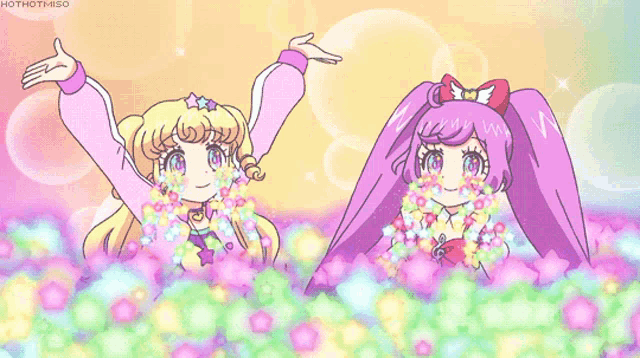 two anime girls are standing in a field of flowers with the words hothotmiso on the bottom