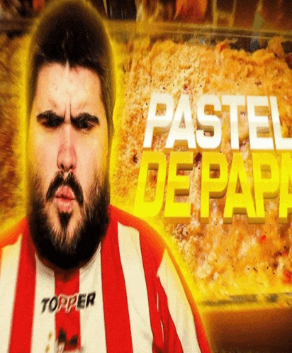 a man with a beard is wearing a red and white striped shirt that says topper