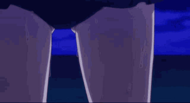 a close up of a person 's stomach with a drop of water coming out of it