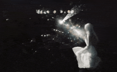 a woman in a white dress with the words make a wish you written above her