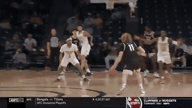 a basketball game between the bengals and titans