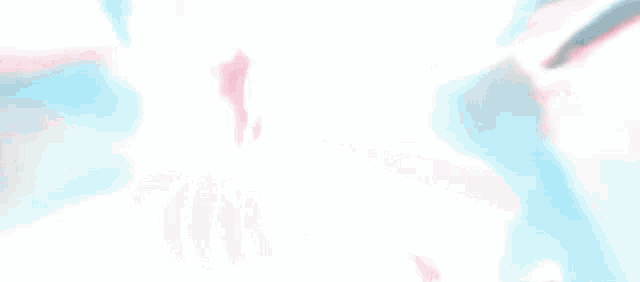 a blurred image of a girl with pink hair standing in front of a blurry background .