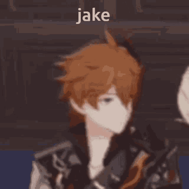 a close up of a person 's face with the word jake above it .