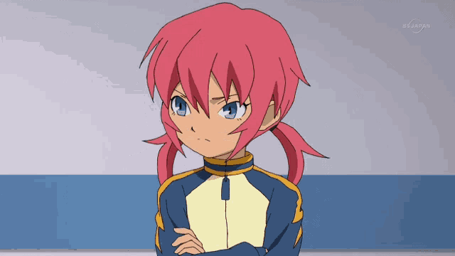 a girl with pink hair and blue eyes is standing with her arms crossed in front of a wall that says tokyo