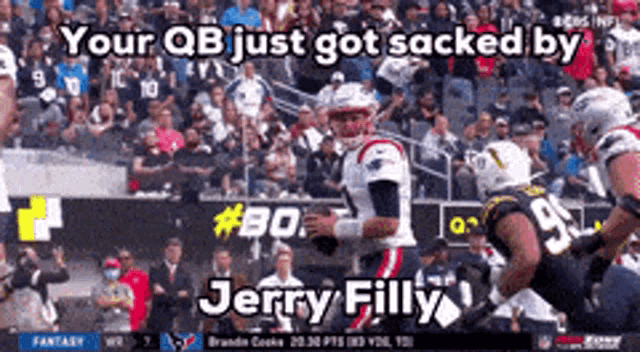 a football player is being tackled by jerry filly during a football game