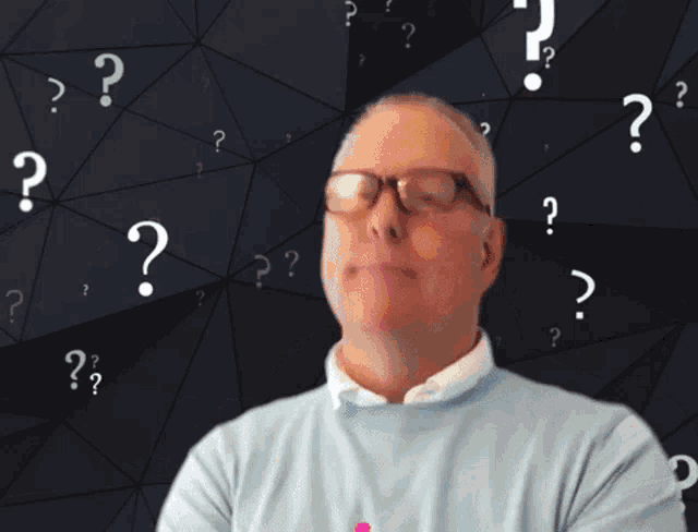 a man with glasses and a question mark behind him says " really "
