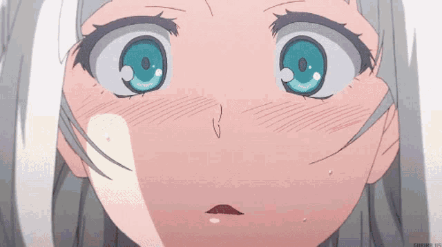 a close up of a girl 's face with a caption that says ' eureka ' on it
