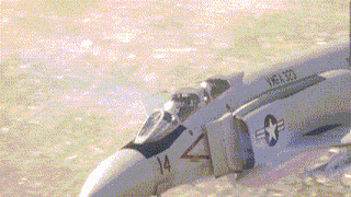 a fighter jet with the number 14 on its nose