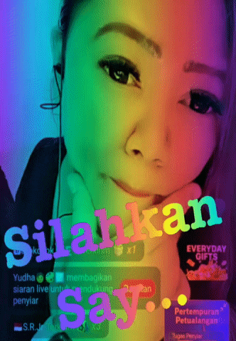 a woman 's face is displayed with the words silakan say on the bottom