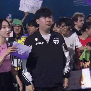 a man wearing a jacket that says gd on it