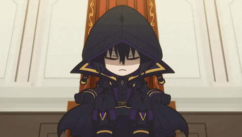 a cartoon character is sitting on a chair with the letter v on his pants