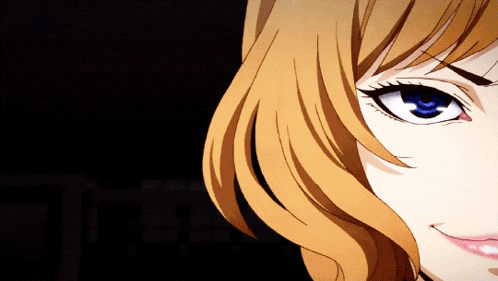 a close up of a woman 's face with a black background