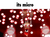 a red background with white dots and the words `` its micro ''