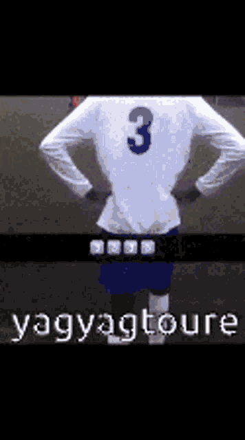 a soccer player with the number 3 on his jersey