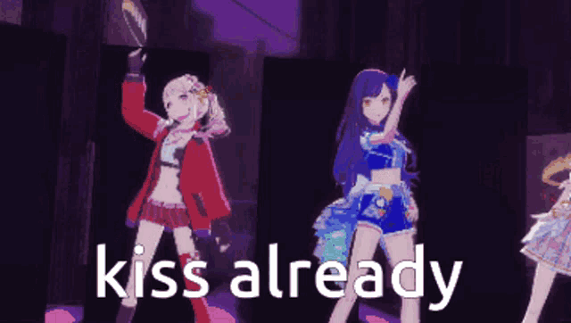 a group of anime girls are dancing on a stage with the words kiss already written in the corner .