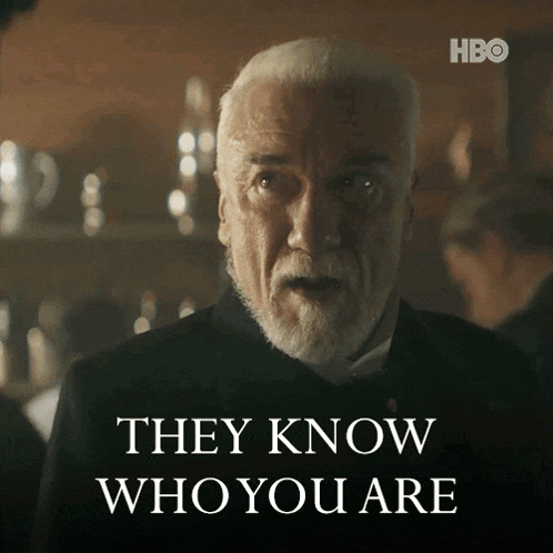a man with white hair and a beard says " they know who you are "