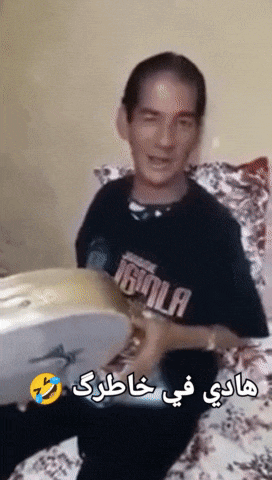 a man wearing a t-shirt that says vanila is playing drums