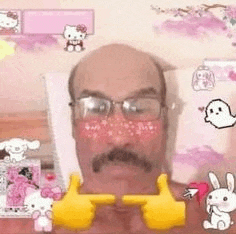 a man with glasses and a mustache is giving a thumbs up with his hands .