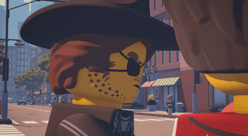 a lego character wearing a hat and sunglasses is standing on a city street