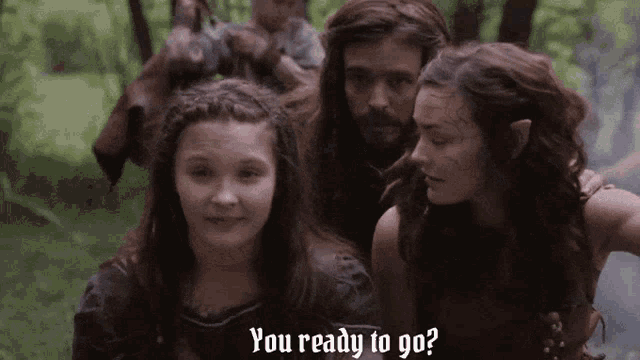 a group of people standing next to each other with the words " you ready to go " on the bottom right