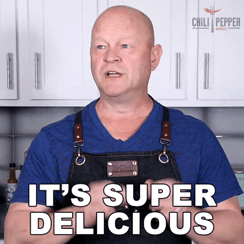 a man wearing a blue shirt and apron says it 's super delicious