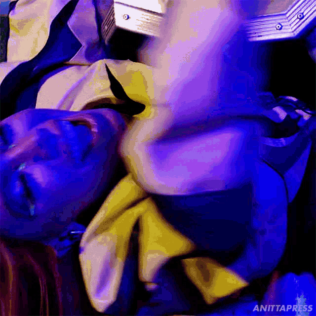 a person is laying on their back with anittapress written on the bottom right corner