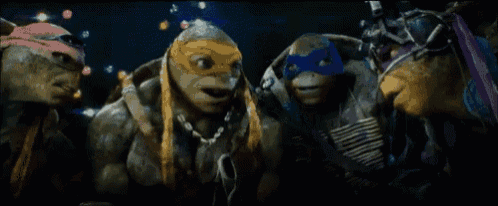 a group of teenage mutant ninja turtles are giving each other the middle finger
