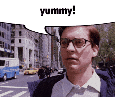 a man with glasses and a speech bubble that says yummy on it