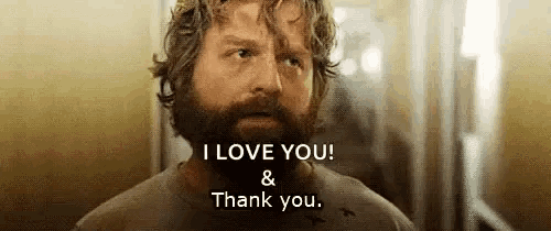 a man with a beard is saying that he loves you and thank you .