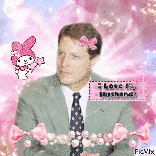 a man in a suit and tie is surrounded by pink hearts and says i love my husband ..