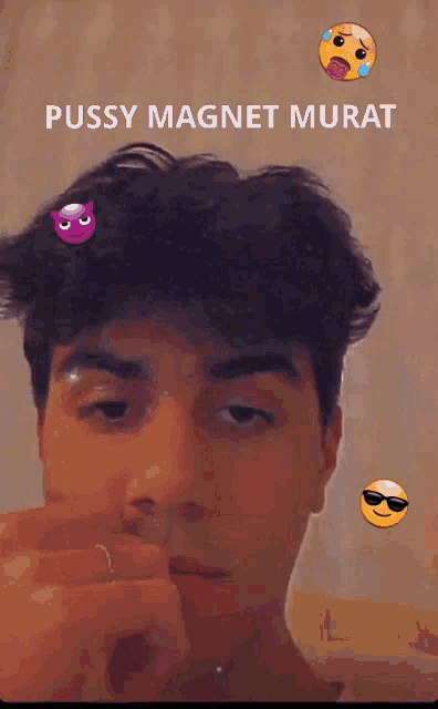 a man 's face is surrounded by emojis and the caption pussy magnet murat