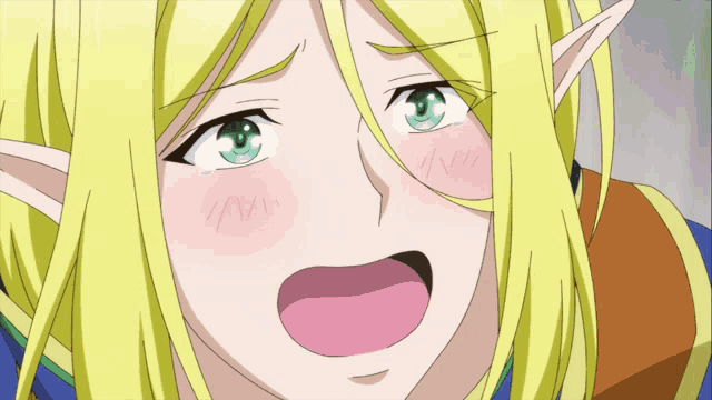 a girl with blonde hair and green eyes is smiling with a cat behind her
