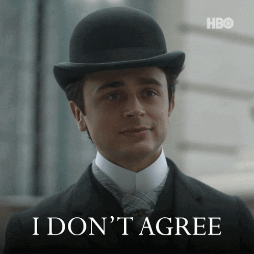 a man in a suit and bowler hat says " i don 't agree "