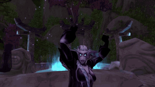 a video game character is standing in front of a waterfall with her hands in the air