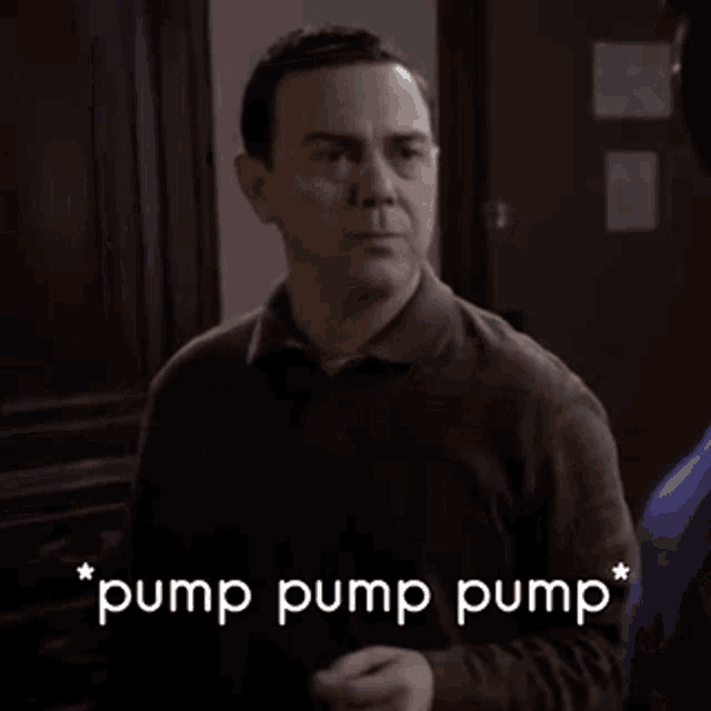 a man is standing in front of a door and the words pump pump pump are above him