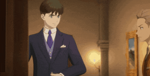 a man in a suit and tie is standing in a room