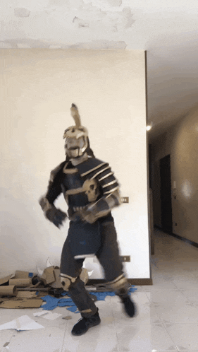 a man in a samurai costume is dancing in a room