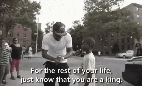 a man talking to a young boy with the words for the rest of your life just know that you are a king below him