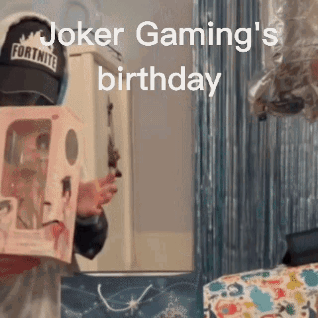 a person wearing a fortnite hat is holding a toy in front of their face