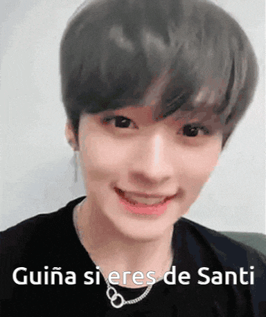 a close up of a person 's face with the words guiana si eres de santi on it .