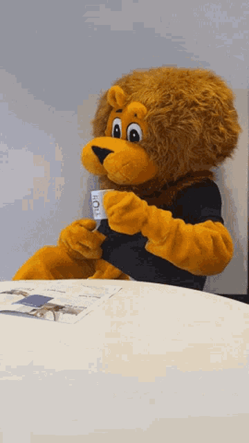 Lion Busy GIF - Lion Busy Newspaper GIFs