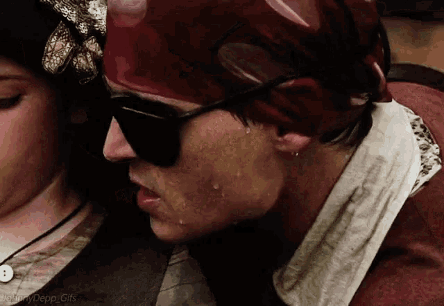 a close up of a person 's face with a watermark that says ' william depp gifs '