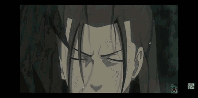 a close up of a person 's face with the words anime show on the bottom right