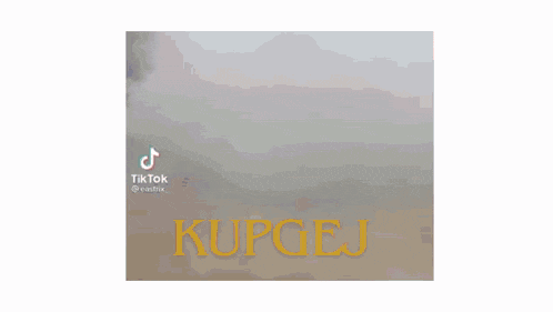 a close up of a man 's face with the word kupgej in the corner
