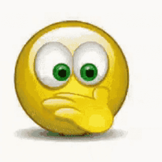 a smiley face with green eyes is holding a red heart in its hand .