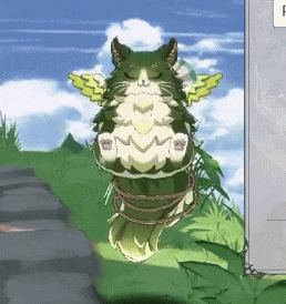 a green and white cat with wings is tied to a rock