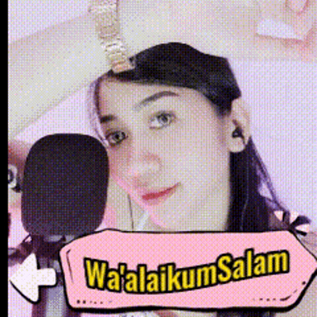 a woman with a sign that says wa ' alaikum salam on it