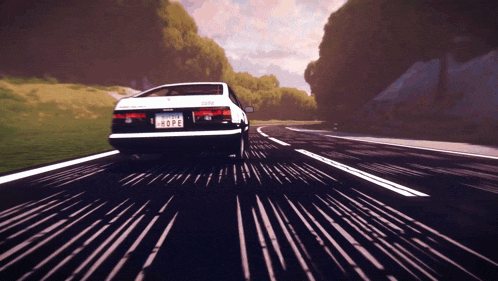 a car is driving down a road with a license plate that says ' a ' on it