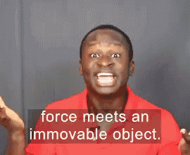 a man in a red shirt is talking about there will be a big bang and another